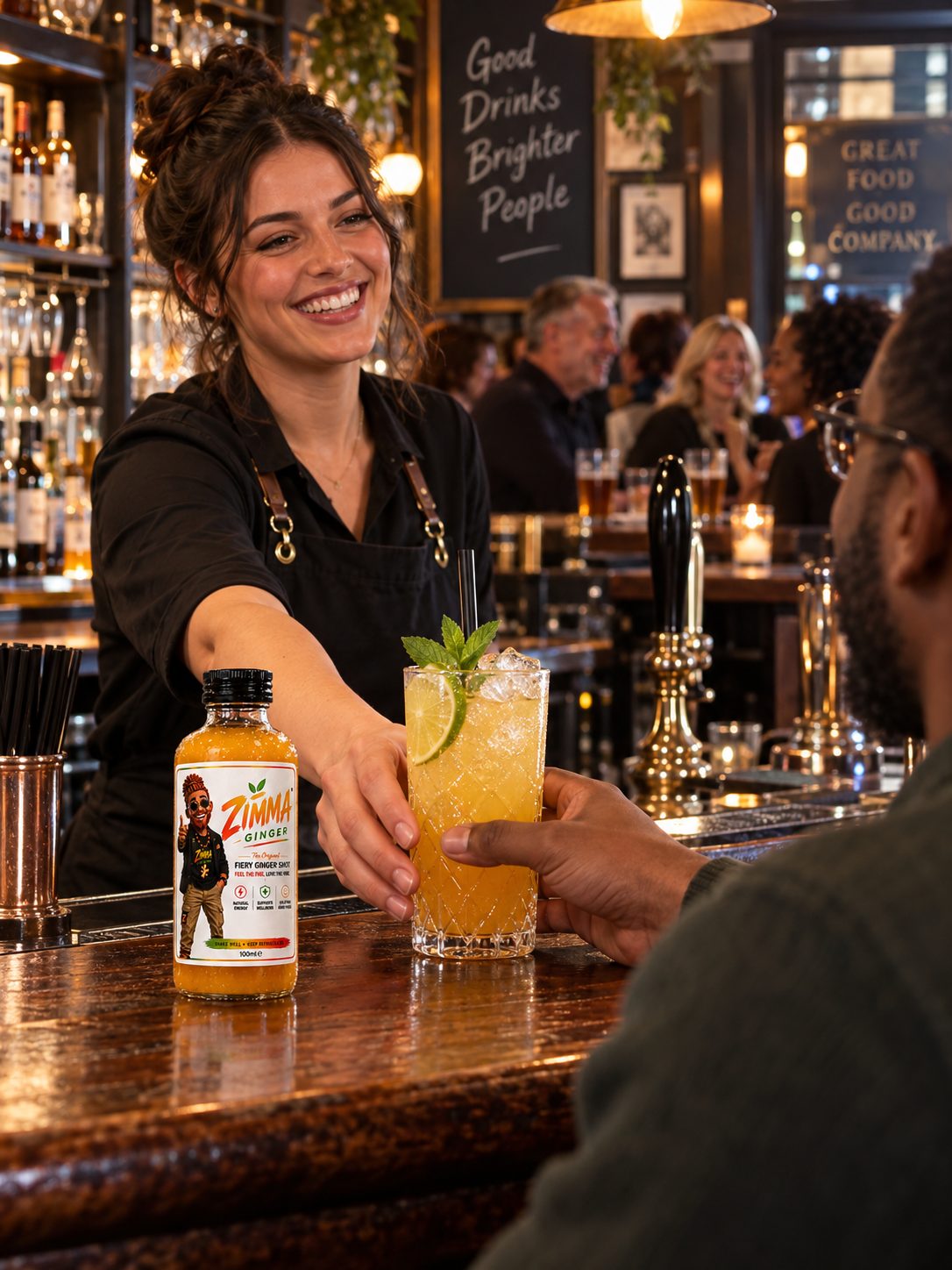 A bartender handing a Zimma Ginger cocktail to a guest at a busy bar